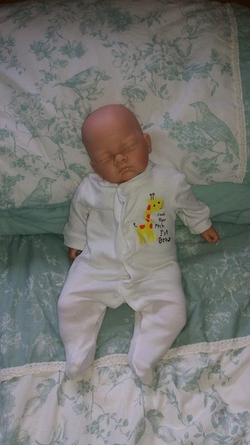 realistic weighted baby doll
